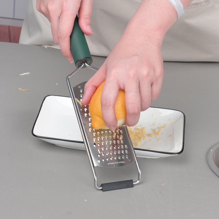 Kitchen helper cheese grater made of stainless steel