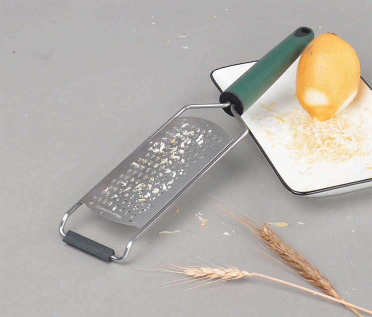 Kitchen helper cheese grater made of stainless steel