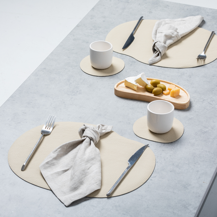 Placemat and coasters made of natural leather, ivory